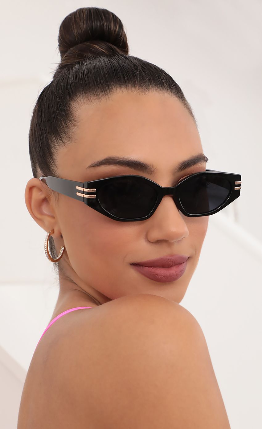 Picture Doheny Sunglasses in Black With Gold Accents. Source: https://media-img.lucyinthesky.com/data/May21_2/850xAUTO/AT2A1659.JPG