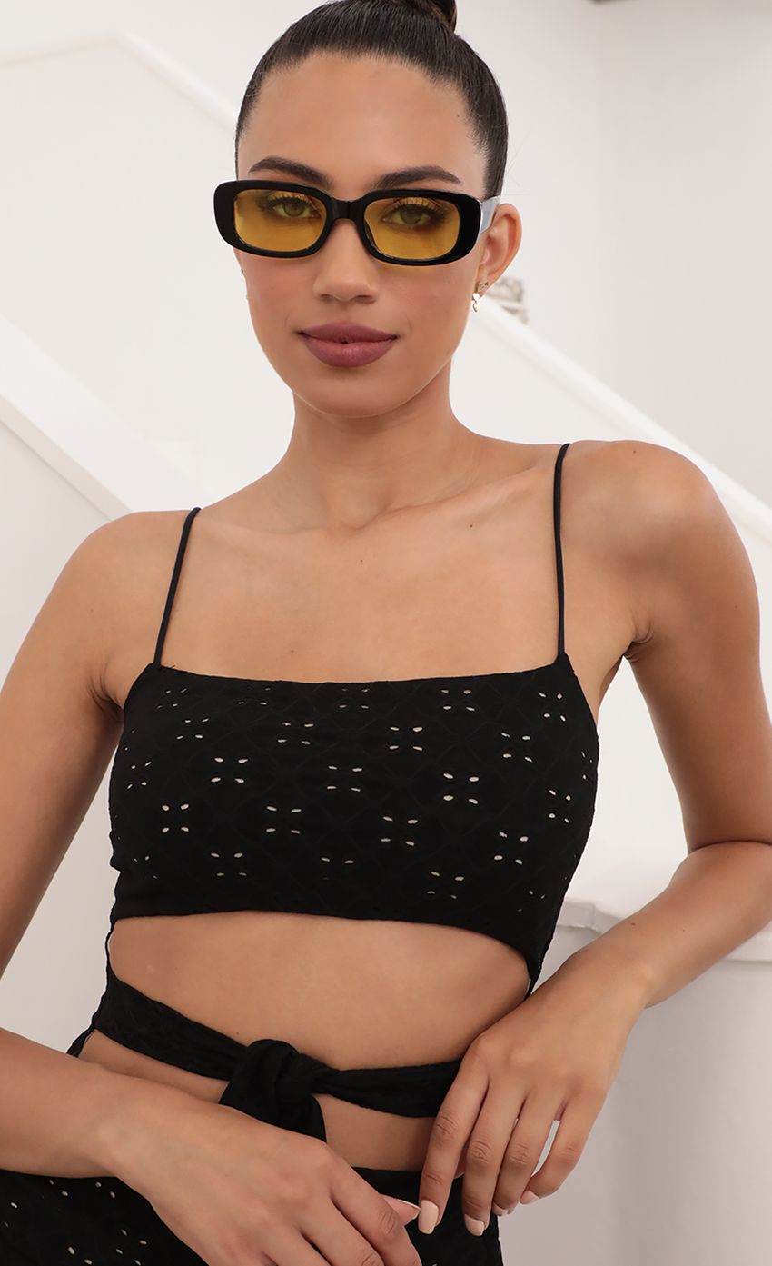 Picture Beverly Rectangular Retro Sunglasses in Black and Yellow. Source: https://media-img.lucyinthesky.com/data/May21_2/850xAUTO/AT2A1750.JPG