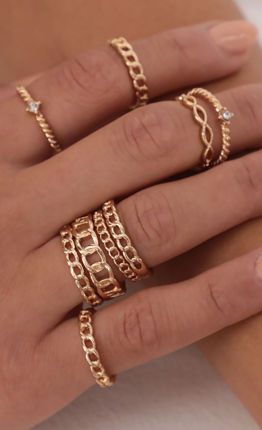 Picture Stackable Gold Link Rings. Source: https://media-img.lucyinthesky.com/data/May21_2/850xAUTO/AT2A6238.JPG