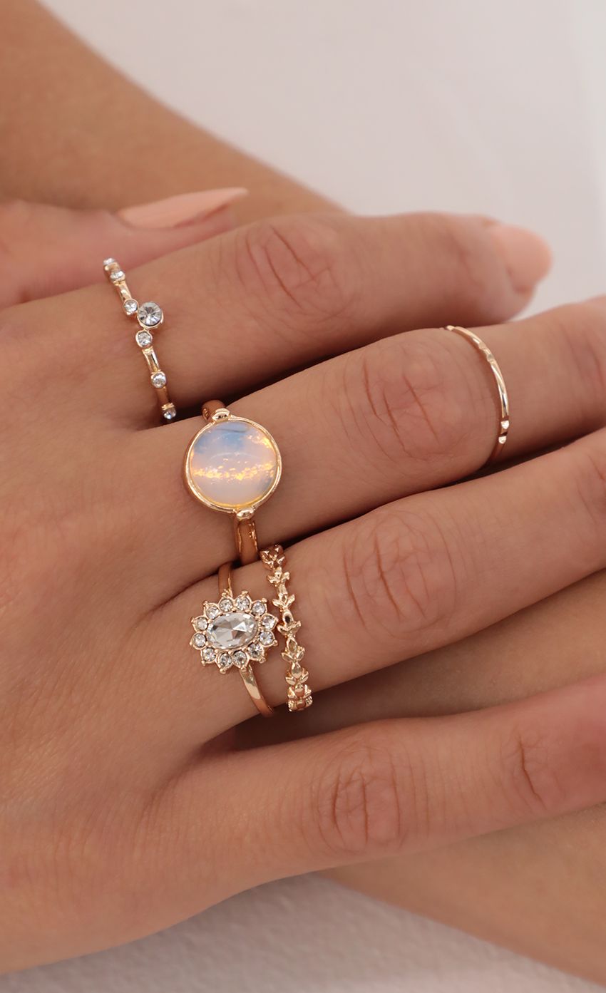 Picture Opal Ring Set in Gold. Source: https://media-img.lucyinthesky.com/data/May21_2/850xAUTO/AT2A6630.JPG
