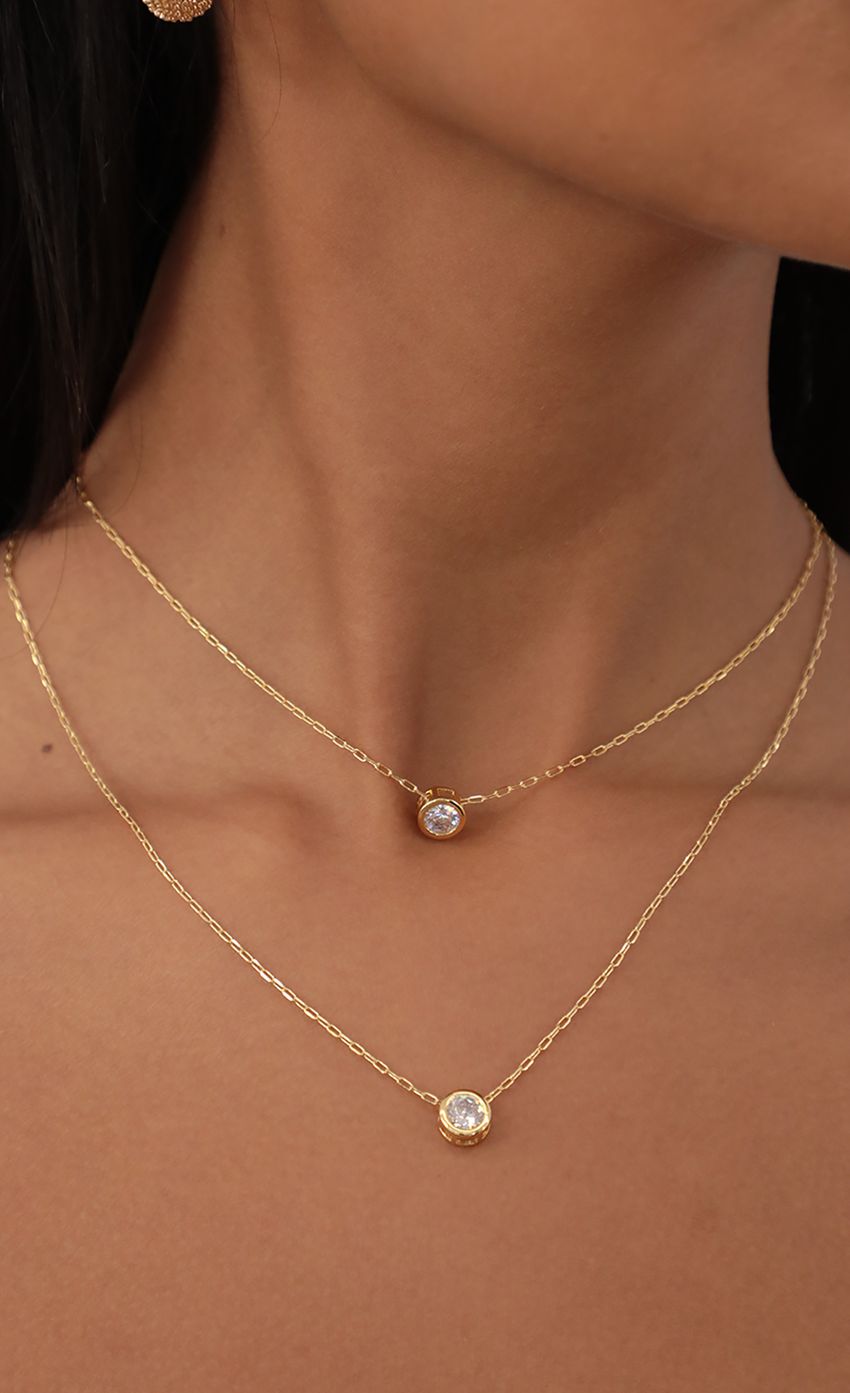 Picture Double Round Bezel-Set Dainty Necklace in Gold. Source: https://media-img.lucyinthesky.com/data/May21_2/850xAUTO/AT2A7318.JPG