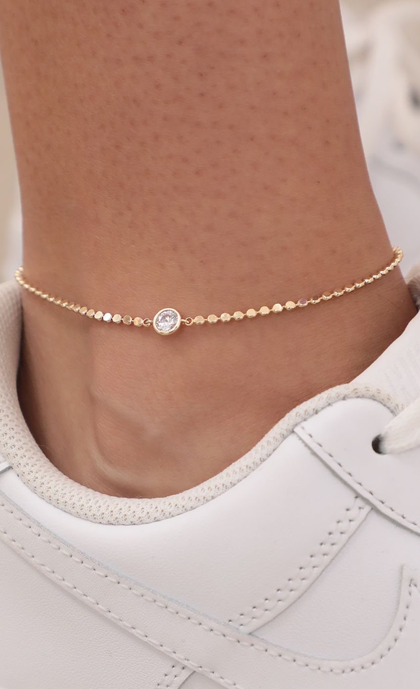Picture Alina Flat beads and Crystal Anklet. Source: https://media-img.lucyinthesky.com/data/May21_2/850xAUTO/AT2A9301.JPG