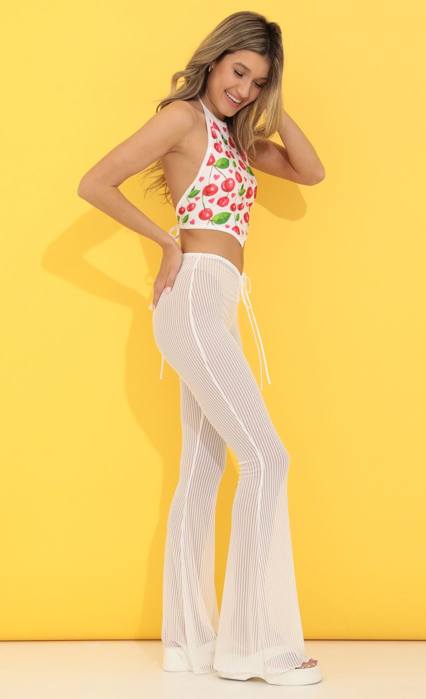Picture Mesh Pants in White. Source: https://media-img.lucyinthesky.com/data/May22_1/850xAUTO/1V9A1239.JPG