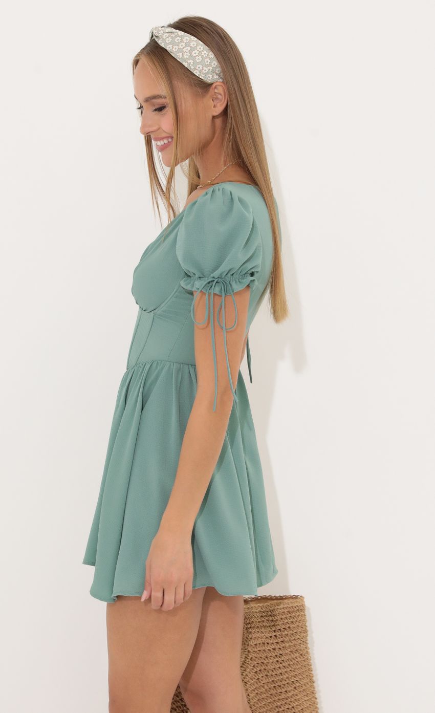 Picture Corset Dress in Green. Source: https://media-img.lucyinthesky.com/data/May22_1/850xAUTO/1V9A2292.JPG