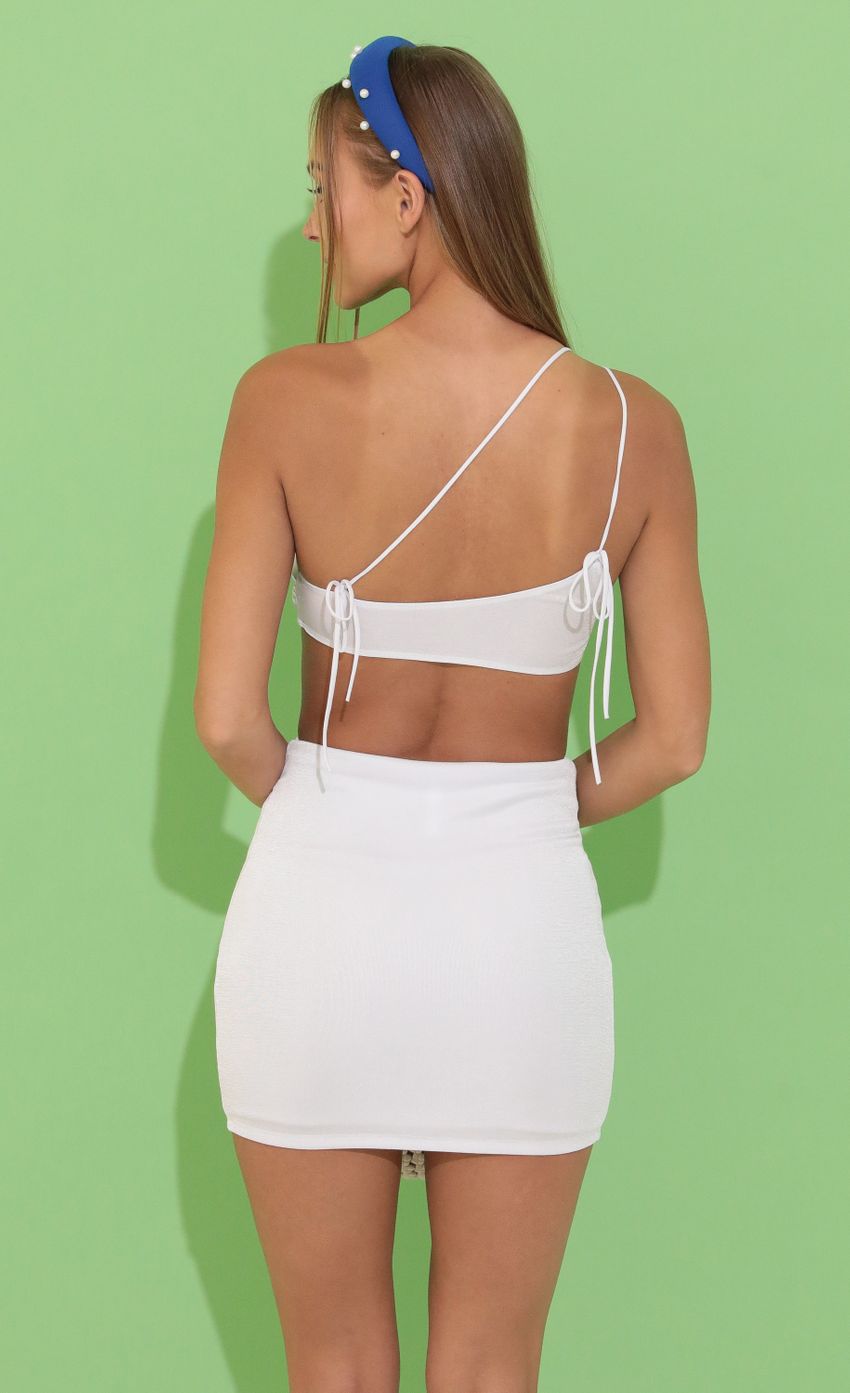 Picture Cutout Dress in White. Source: https://media-img.lucyinthesky.com/data/May22_1/850xAUTO/1V9A3343.JPG