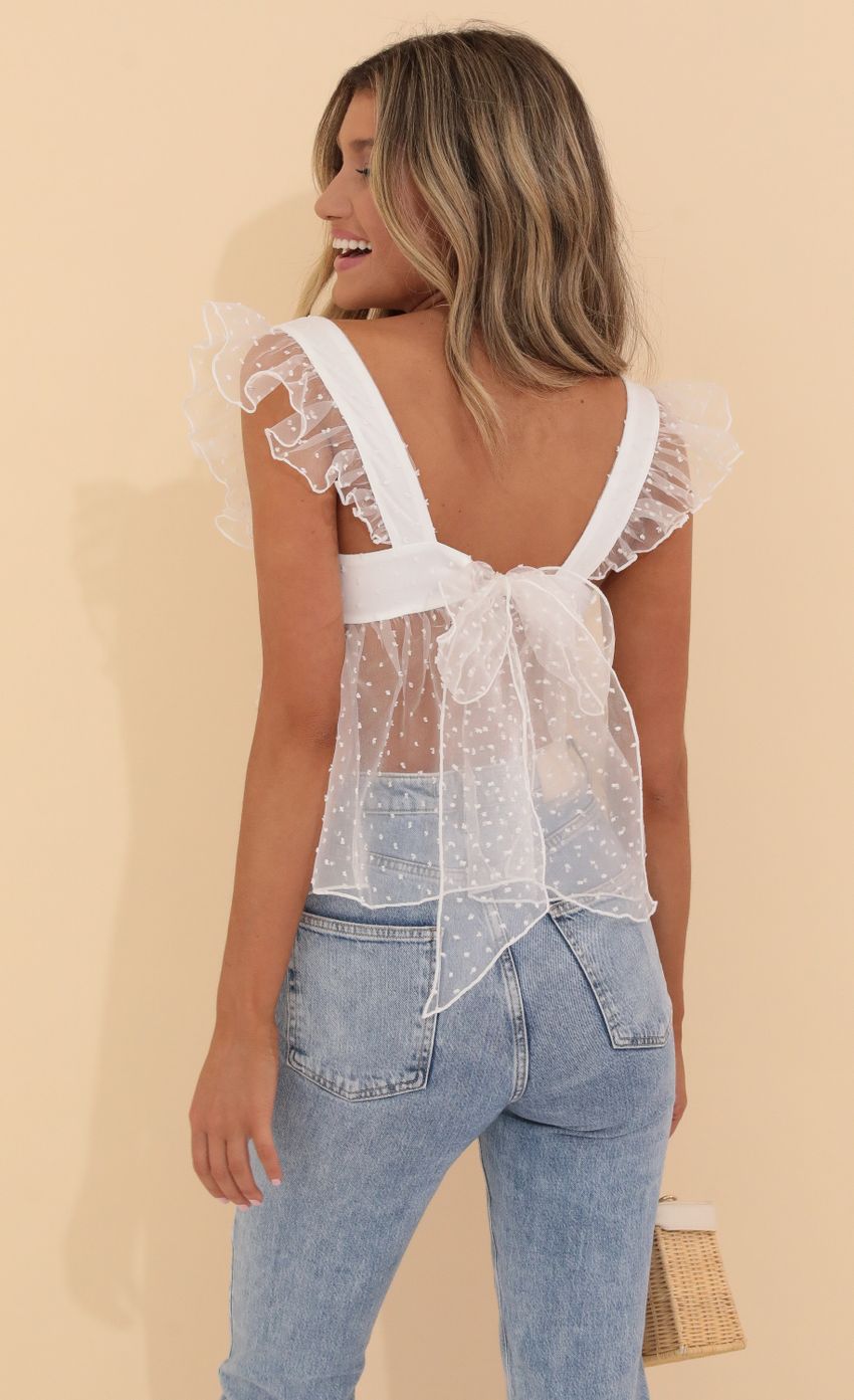 Picture Baby Doll Top in White Dots. Source: https://media-img.lucyinthesky.com/data/May22_1/850xAUTO/1V9A5136.JPG