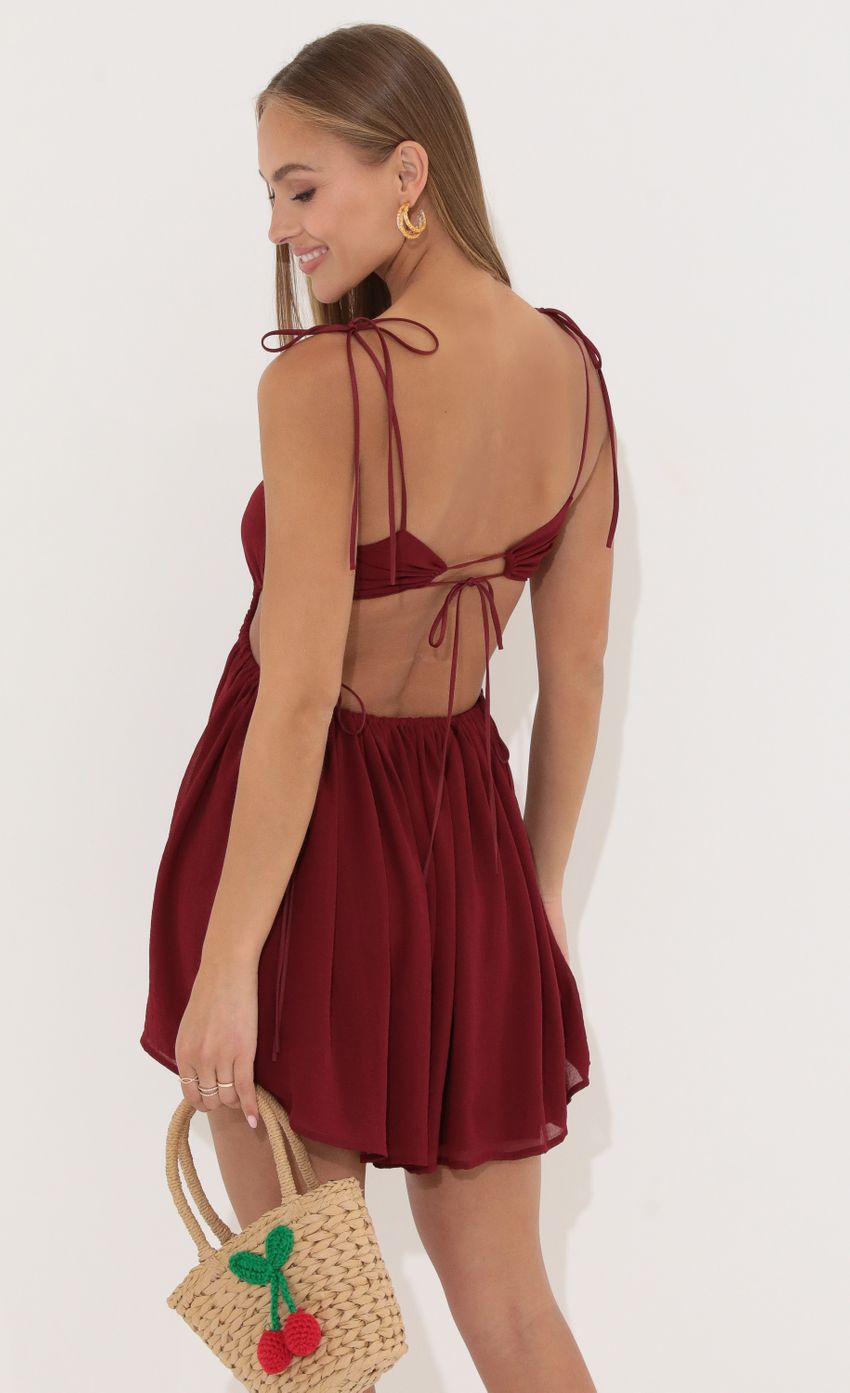 Picture Open Back Dress in Red. Source: https://media-img.lucyinthesky.com/data/May22_1/850xAUTO/1V9A5901.JPG
