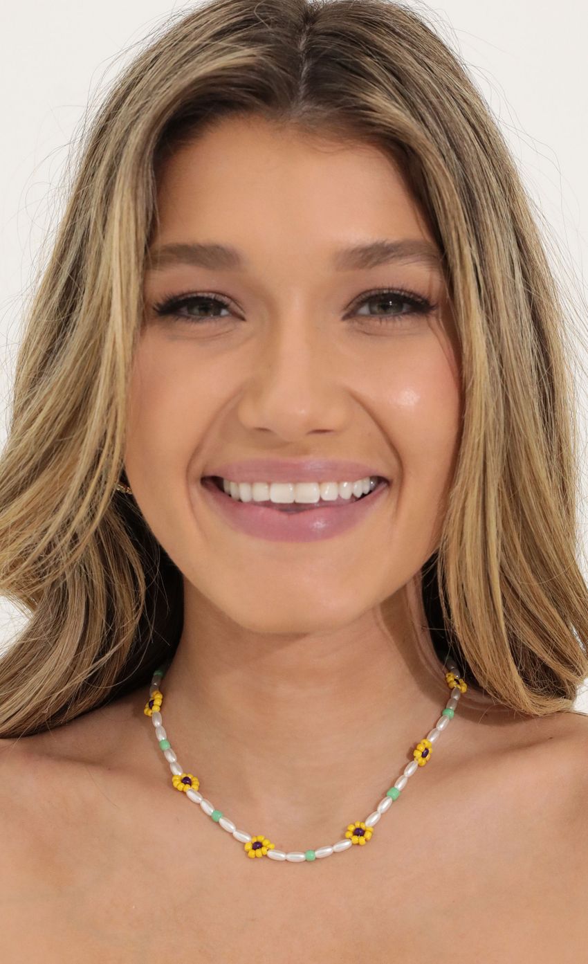 Picture Fling Into Spring Beaded Necklace in Yellow. Source: https://media-img.lucyinthesky.com/data/May22_1/850xAUTO/1V9A5951.JPG