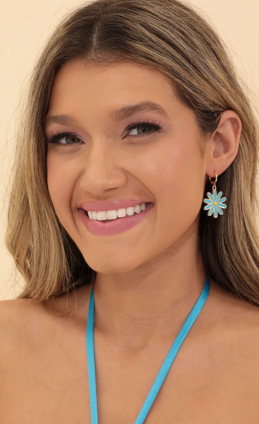 Picture Girl Like Me Earring in Blue. Source: https://media-img.lucyinthesky.com/data/May22_1/850xAUTO/1V9A7551.JPG