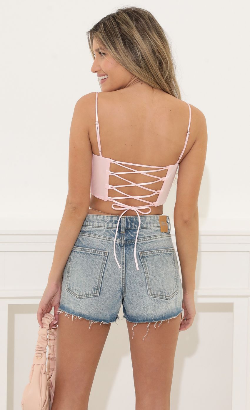 Picture Corset Top in Pink. Source: https://media-img.lucyinthesky.com/data/May22_1/850xAUTO/1V9A8646.JPG