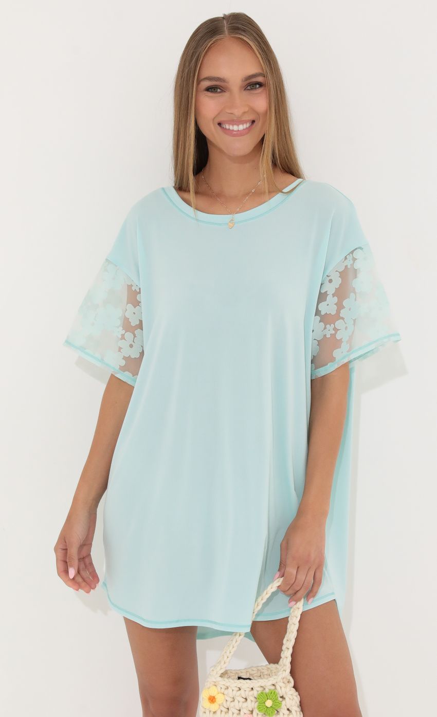 Picture Shirt Dress in Teal Flowers. Source: https://media-img.lucyinthesky.com/data/May22_2/850xAUTO/1V9A0578.JPG