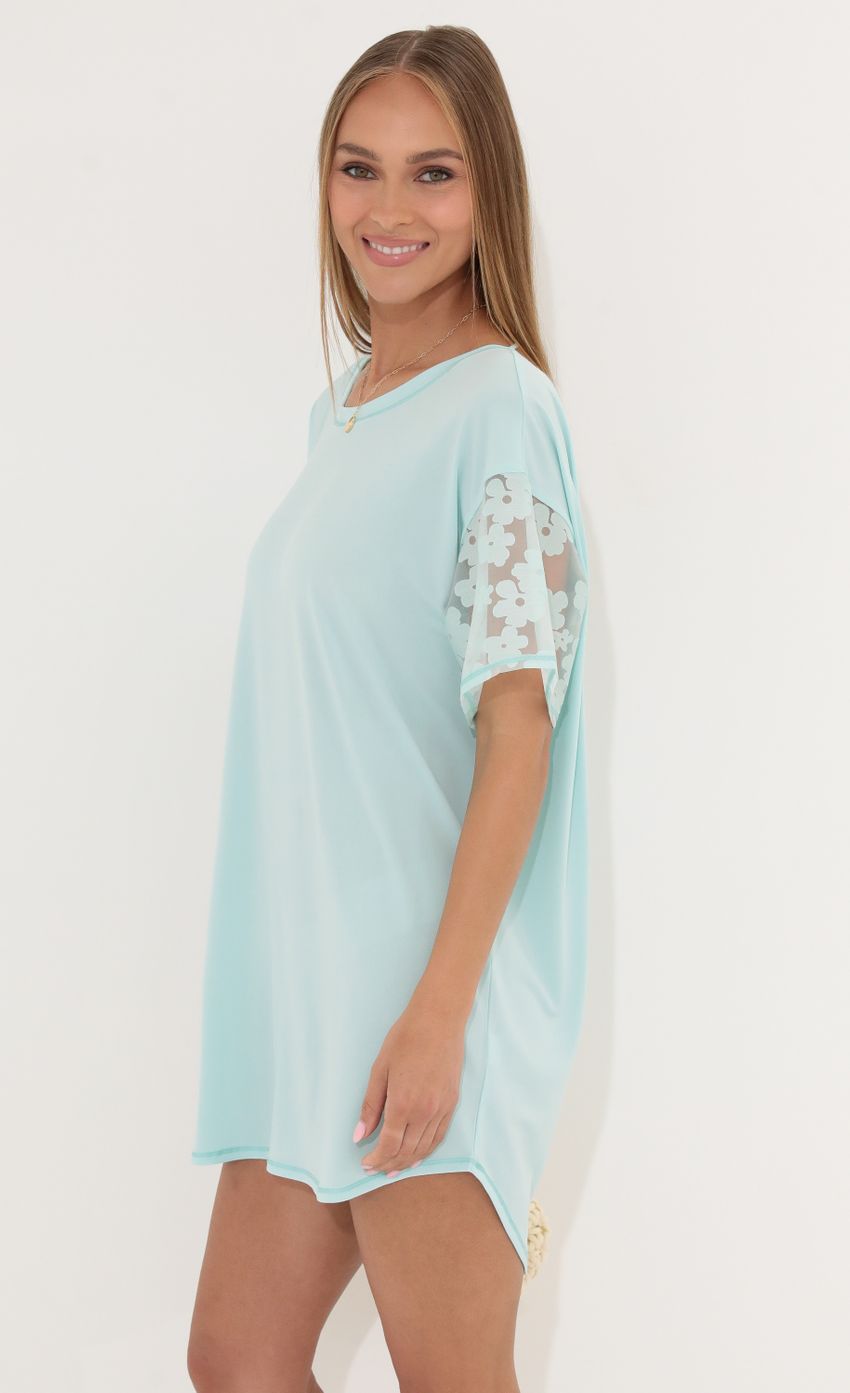 Picture Shirt Dress in Teal Flowers. Source: https://media-img.lucyinthesky.com/data/May22_2/850xAUTO/1V9A0594.JPG