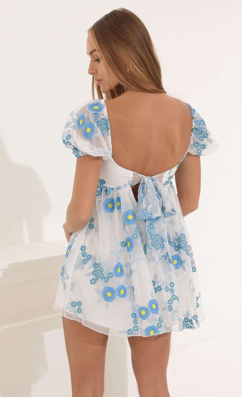 Picture Baby Doll Dress in White Floral. Source: https://media-img.lucyinthesky.com/data/May22_2/850xAUTO/1V9A1434.JPG