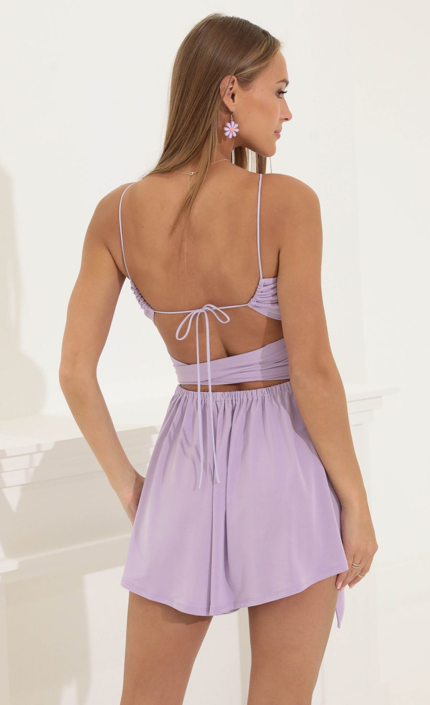 Picture Wrap Romper in Purple. Source: https://media-img.lucyinthesky.com/data/May22_2/850xAUTO/1V9A3000.JPG