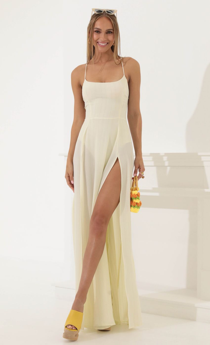 Picture Crepe Pinstripe Maxi Dress in Cream. Source: https://media-img.lucyinthesky.com/data/May22_2/850xAUTO/1V9A4989.JPG