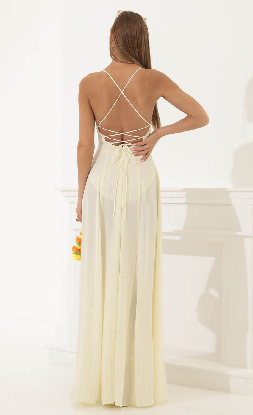 Picture Crepe Pinstripe Maxi Dress in Cream. Source: https://media-img.lucyinthesky.com/data/May22_2/850xAUTO/1V9A5247.JPG