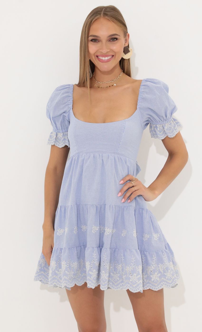 Picture Susie Floral Cotton Baby Doll Dress in Blue. Source: https://media-img.lucyinthesky.com/data/May22_2/850xAUTO/1V9A6151.JPG