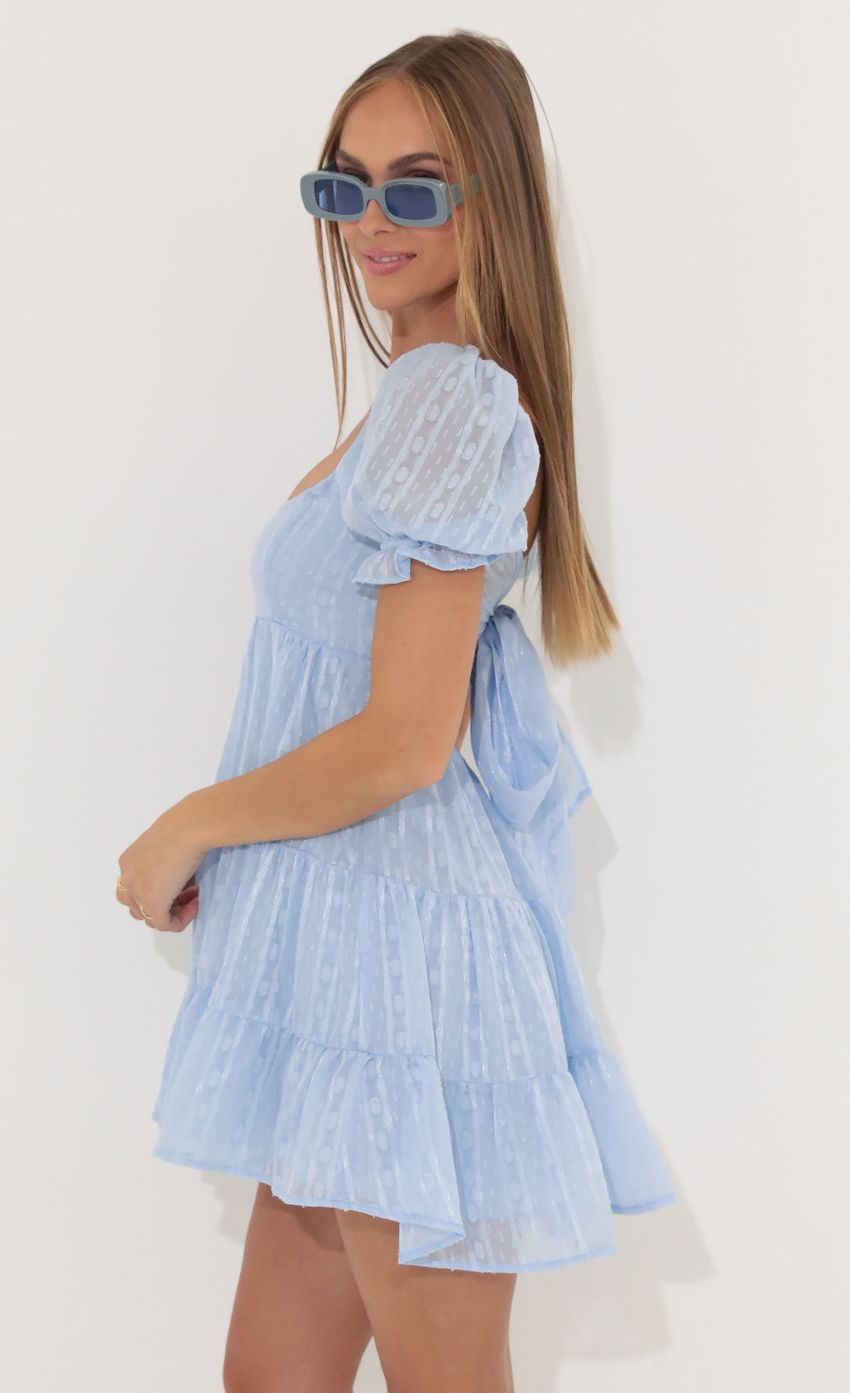 Picture Chiffon Fit and Flare Dress in Blue. Source: https://media-img.lucyinthesky.com/data/May22_2/850xAUTO/1V9A8624.JPG