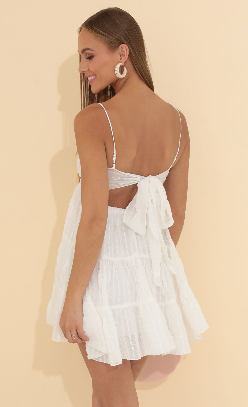 Picture Striped Chelsea Chiffon Dress in White. Source: https://media-img.lucyinthesky.com/data/May22_2/850xAUTO/1V9A9133.JPG