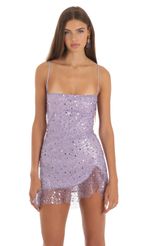 Picture Shimmer Sequin Ruffle Dress in Purple. Source: https://media-img.lucyinthesky.com/data/May23/150xAUTO/0d74f4c3-bddd-493f-b5d8-86784685ff9f.jpg