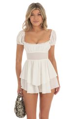 Picture Crepe Romper in White. Source: https://media-img.lucyinthesky.com/data/May23/150xAUTO/3ad762e8-8aca-4187-b4fb-fb74ef765af6.jpg