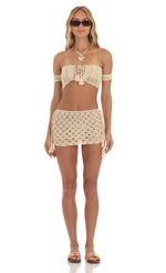 Picture Crochet Off Shoulder Two Piece Skirt Set in Beige. Source: https://media-img.lucyinthesky.com/data/May23/150xAUTO/3f2aeeca-209e-445f-9651-ba725591bb6b.jpg
