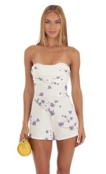 Picture Cherry Butterfly Strapless Romper in White. Source: https://media-img.lucyinthesky.com/data/May23/150xAUTO/a634909f-53c0-4fe9-8c49-f0292622cb2b.jpg