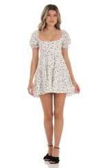 Picture Fit and Flare Dress in Dot White. Source: https://media-img.lucyinthesky.com/data/May23/150xAUTO/c2e2aaa1-148c-497b-974b-2fee3261a6f1.jpg
