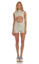 Picture Kiwi Cutout Romper in Purple. Source: https://media-img.lucyinthesky.com/data/May23/150xAUTO/dc567d53-77b0-48dd-ad31-05a106ff72b0.jpg