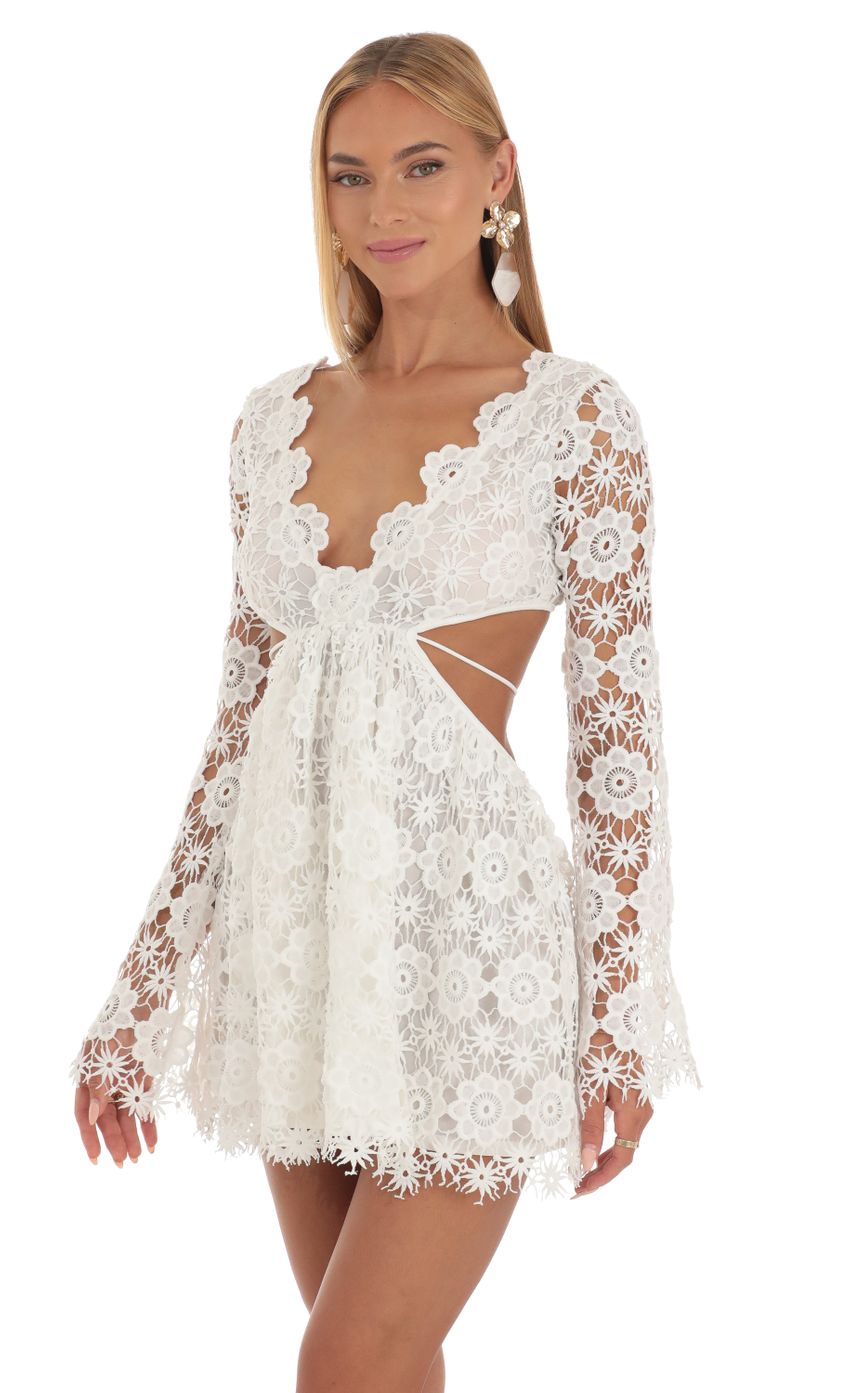 Picture Embroidery Cut-Out Mini Dress in White. Source: https://media-img.lucyinthesky.com/data/May23/850xAUTO/026d78c4-cc7c-4ba2-ba2b-ae081498bd47.jpg