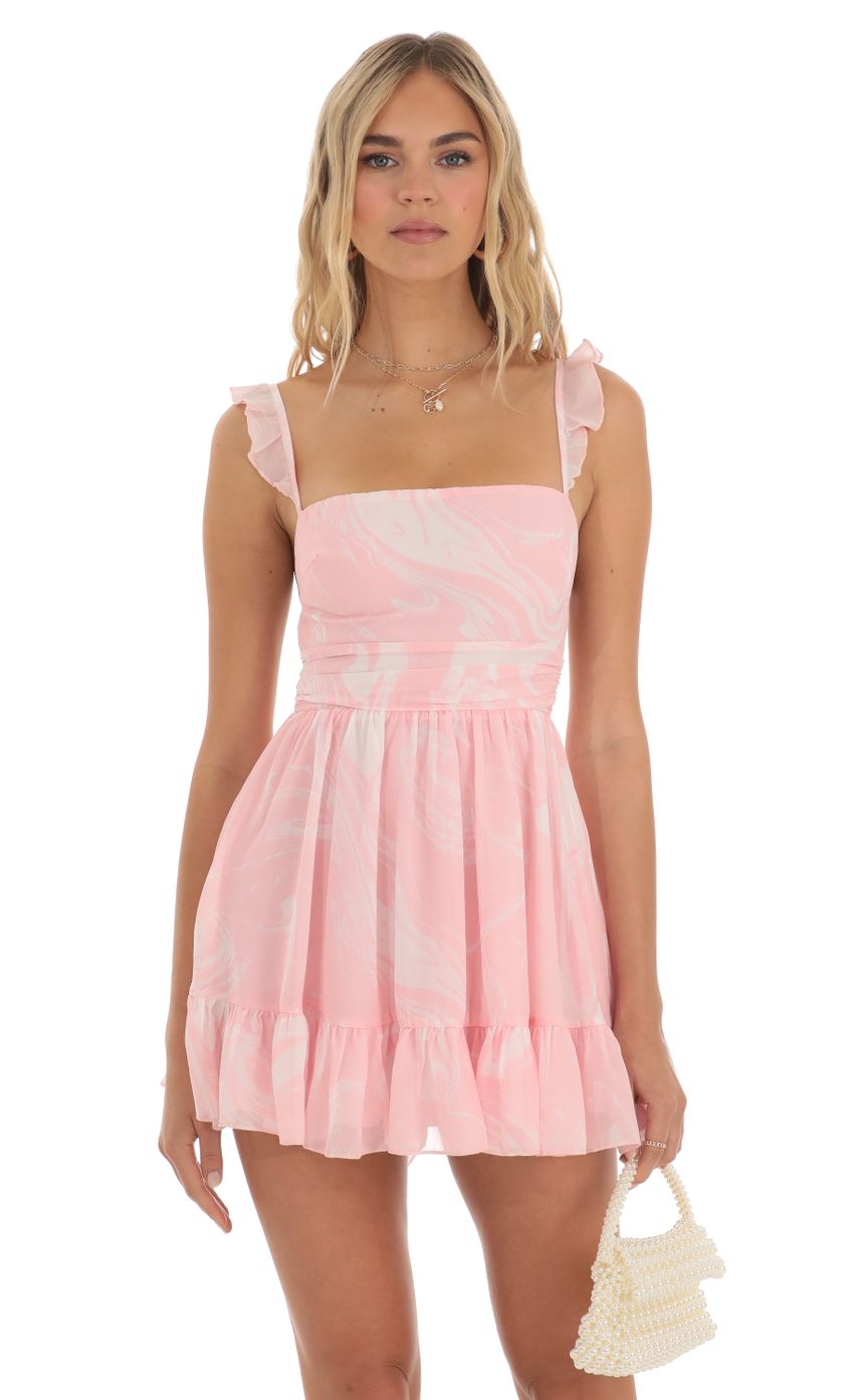 Picture Chiffon Fit and Flare Dress in Pink Swirl. Source: https://media-img.lucyinthesky.com/data/May23/850xAUTO/07e3cba4-edb6-435e-a940-8610d804e76e.jpg