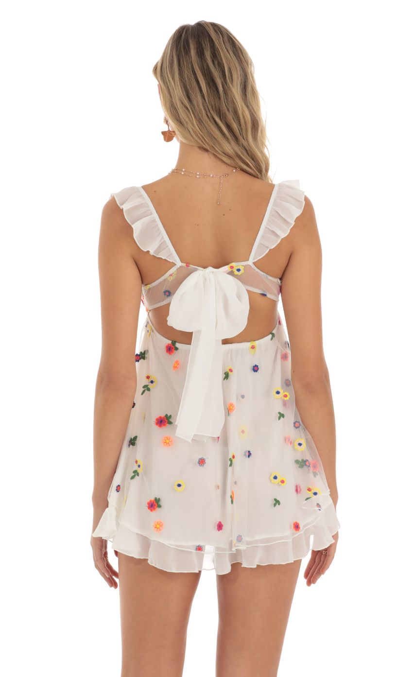 Picture Multi Floral Babydoll Dress in White. Source: https://media-img.lucyinthesky.com/data/May23/850xAUTO/36e12670-ef2c-48f1-869f-797e73182742.jpg