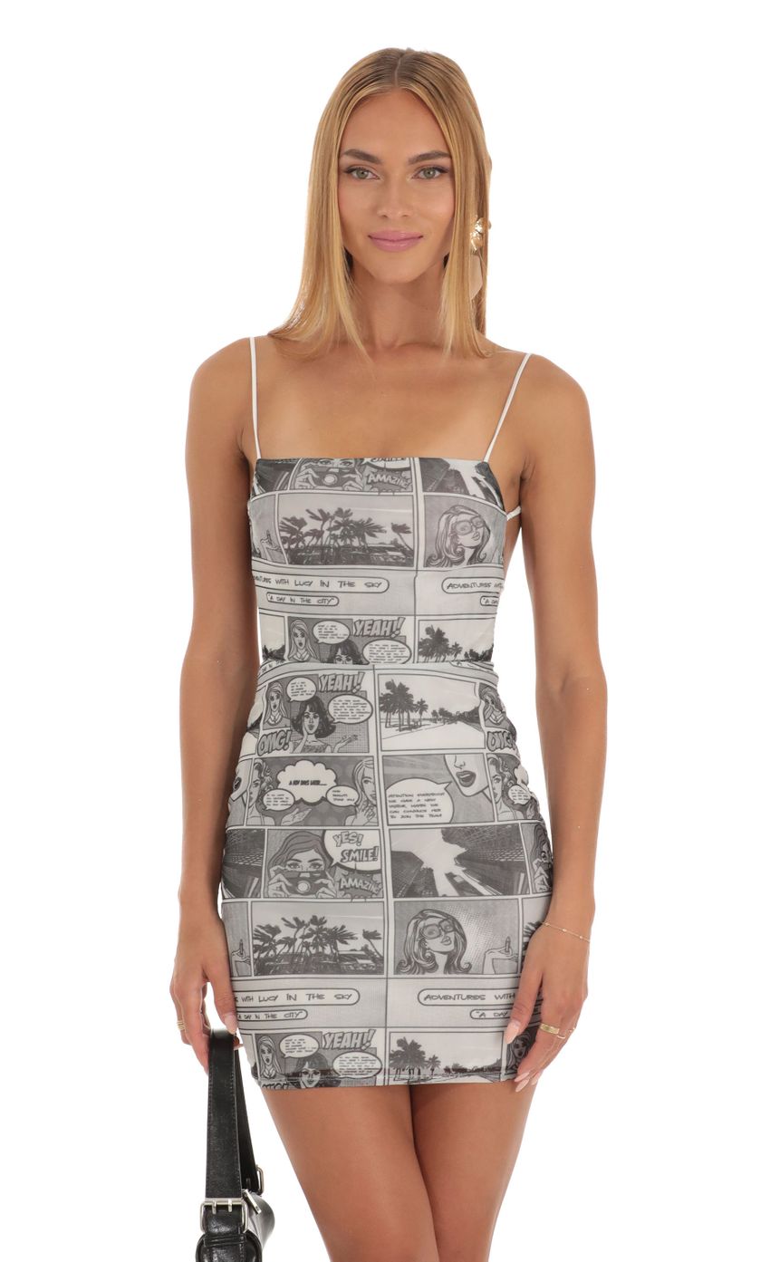 Picture Starstruck Mesh Dress with Comics Print. Source: https://media-img.lucyinthesky.com/data/May23/850xAUTO/39161654-9c44-469d-9159-f7d2567963df.jpg