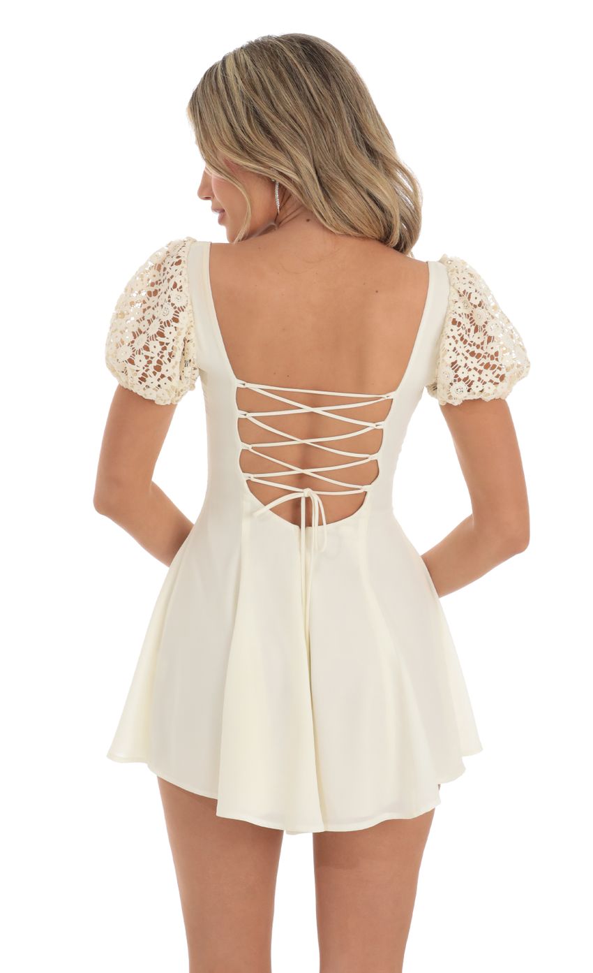 Picture Puff Sleeve Dress in Cream with Crochet Sleeves. Source: https://media-img.lucyinthesky.com/data/May23/850xAUTO/472db4f5-fc53-4fb7-b7d9-fac6162caed5.jpg