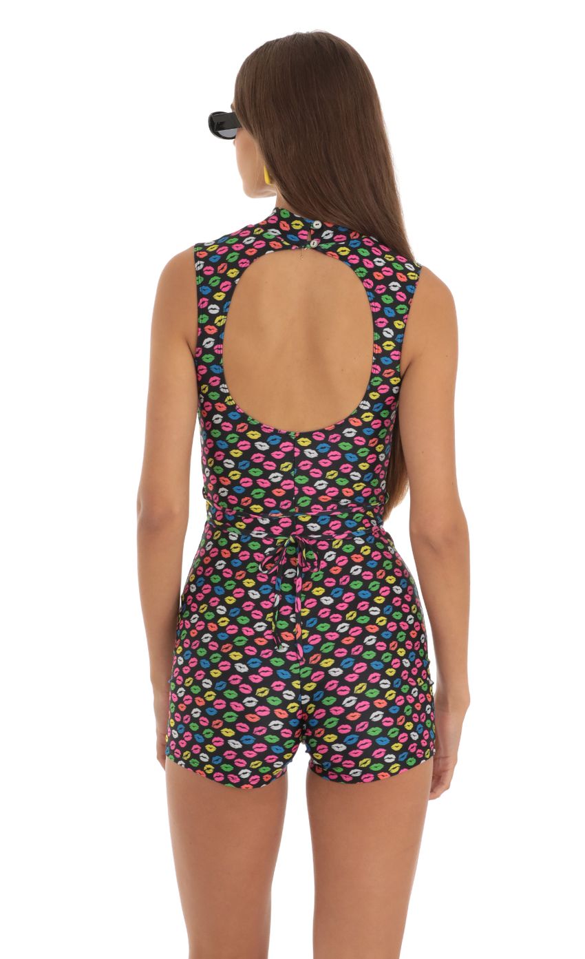 Picture Kiss Cutout Romper in Black. Source: https://media-img.lucyinthesky.com/data/May23/850xAUTO/4a9a1b8e-c5c7-4746-bc6d-8a8eb1e0bfb1.jpg