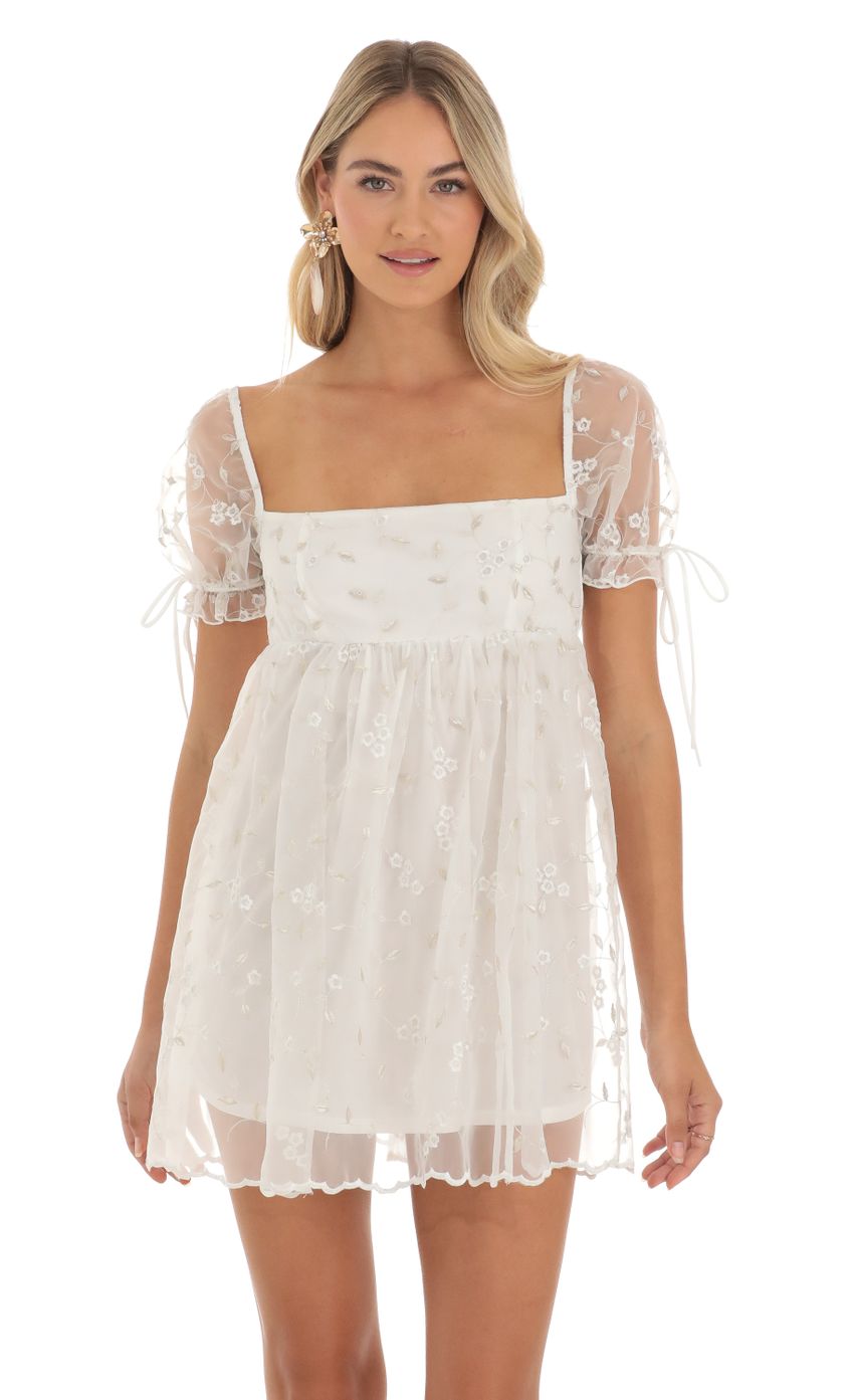 Picture Embroidered Floral Baby Doll Dress in White. Source: https://media-img.lucyinthesky.com/data/May23/850xAUTO/59f2bb61-a9c7-4c4b-82df-a11a3787c4ad.jpg