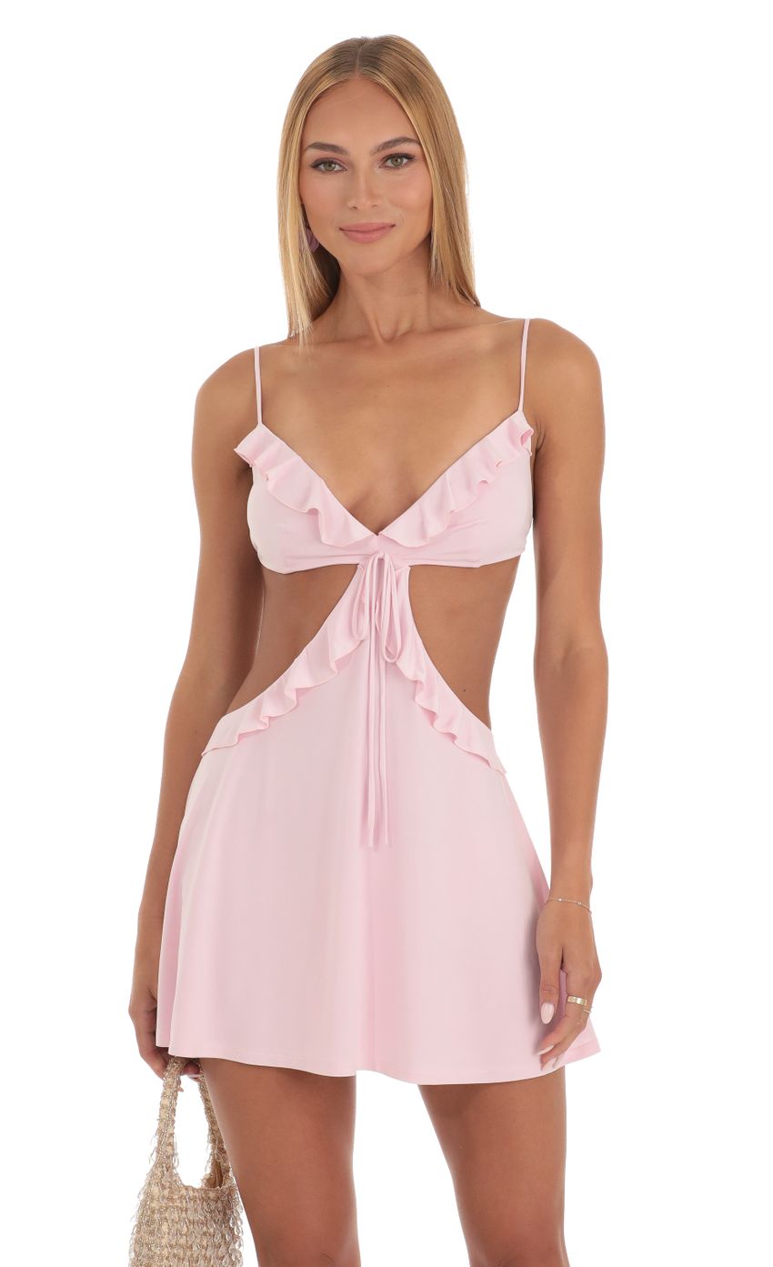 Picture Ruffle Cut-Out Dress in Pink. Source: https://media-img.lucyinthesky.com/data/May23/850xAUTO/61a2e395-79ea-4745-9888-3ce43e94b231.jpg