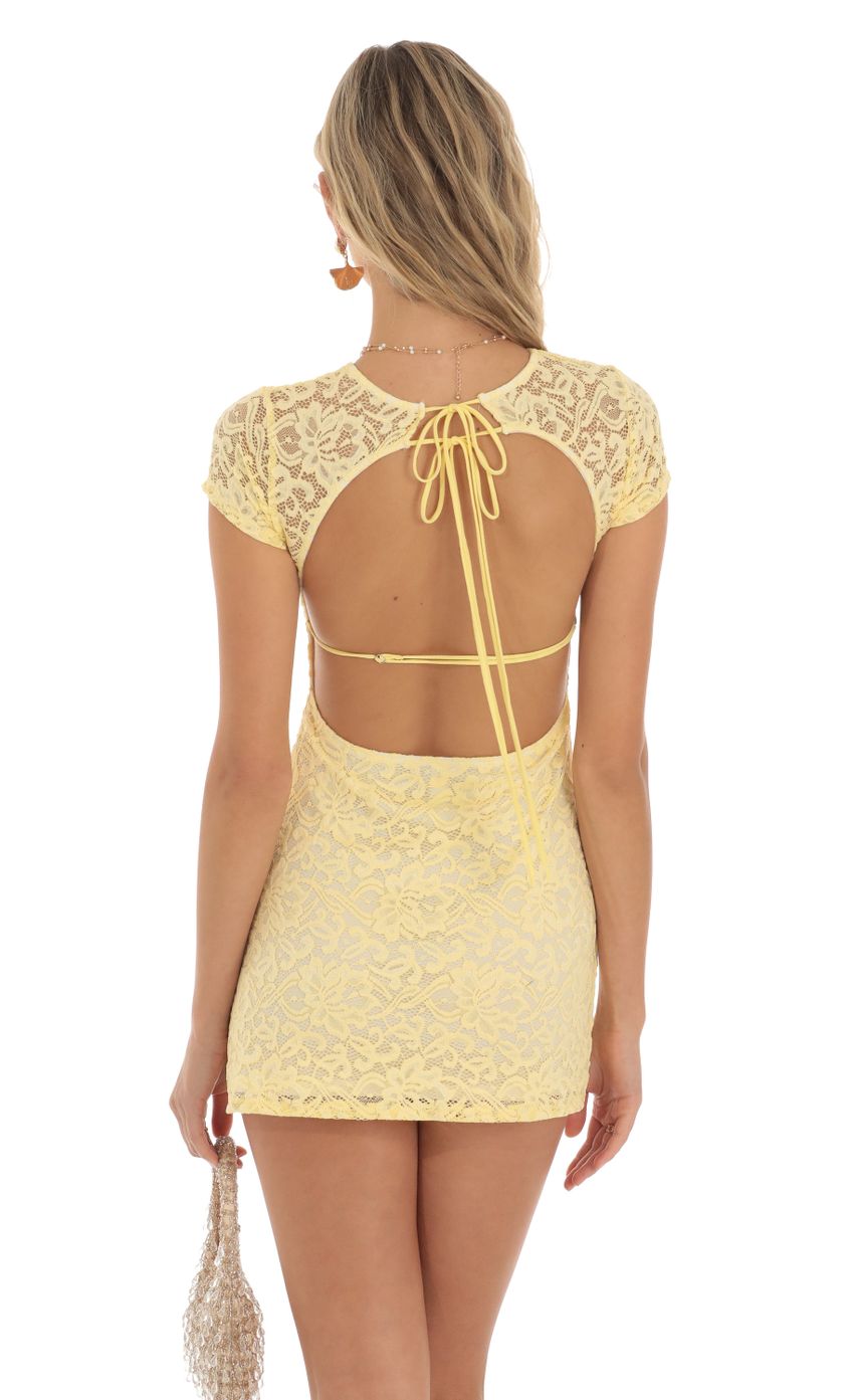 Picture Lace Open Back Mini Dress in Yellow. Source: https://media-img.lucyinthesky.com/data/May23/850xAUTO/662b02ea-0dd9-4d6f-b81c-f1045a137098.jpg