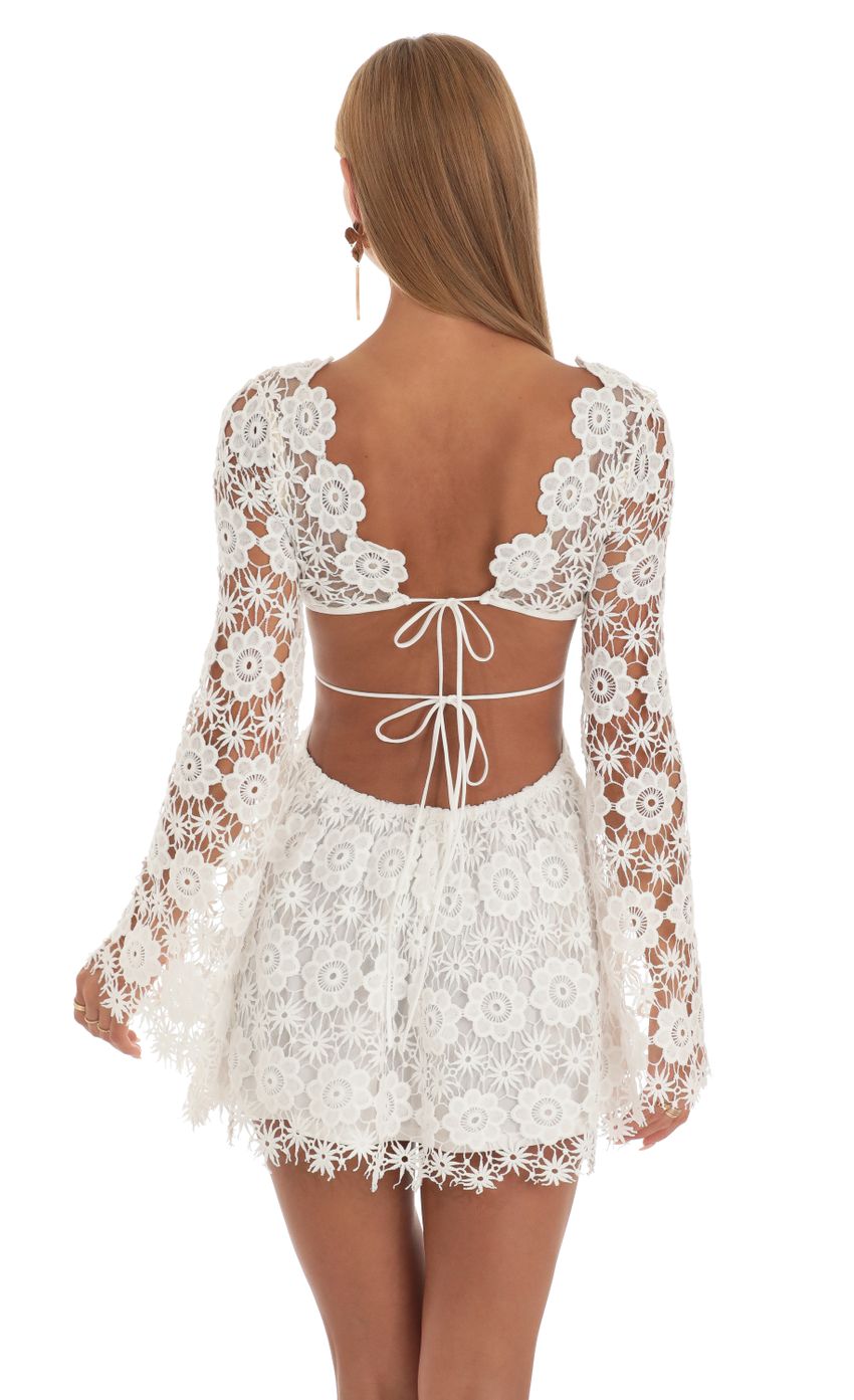 Picture Embroidery Cut-Out Mini Dress in White. Source: https://media-img.lucyinthesky.com/data/May23/850xAUTO/69d98036-994a-4e00-8c9e-8b27f7bd8316.jpg