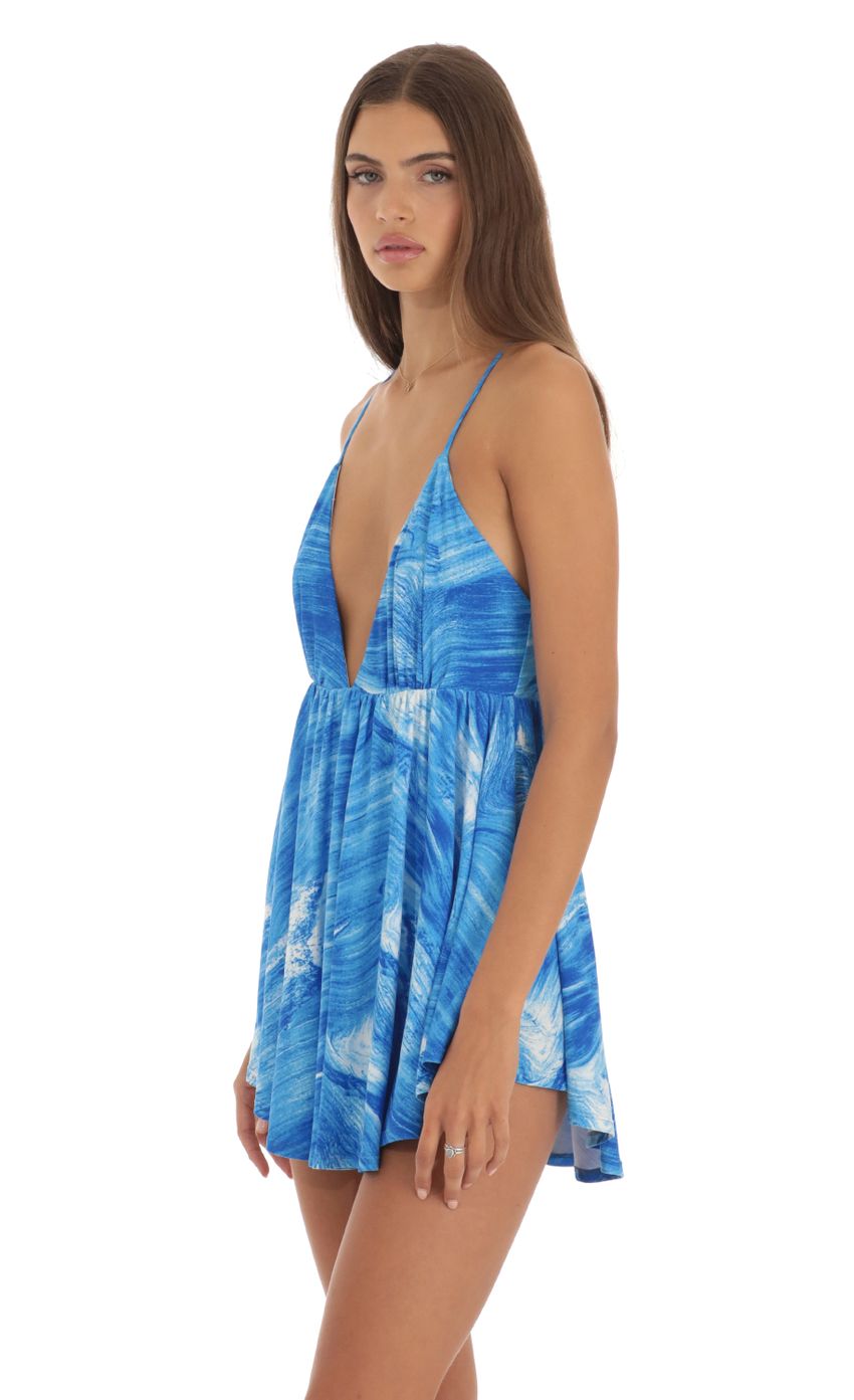 Picture Flare Romper in Blue Swirl. Source: https://media-img.lucyinthesky.com/data/May23/850xAUTO/77c55bd4-25f7-451c-91ba-7060a5c6c57c.jpg