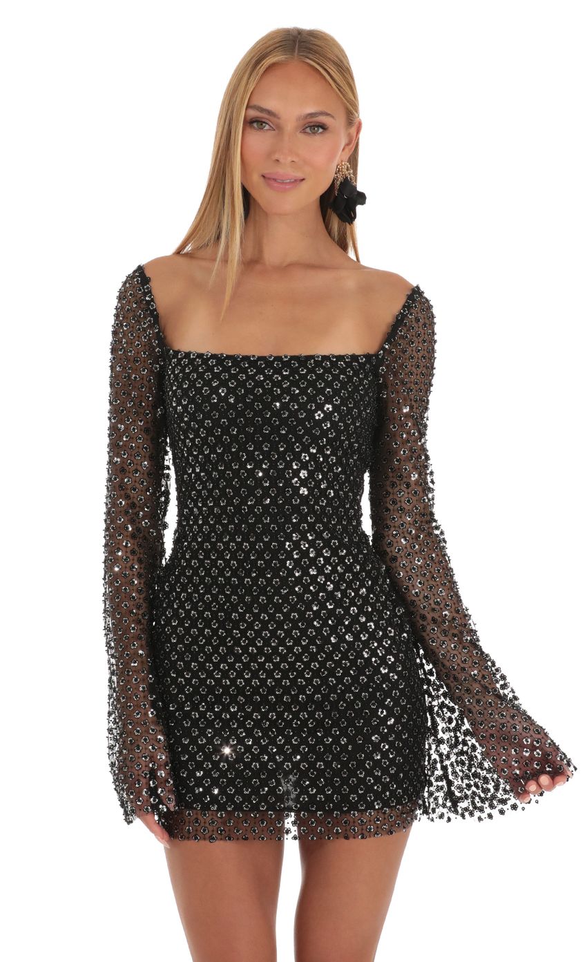 Picture Sequin Floral Bell Sleeve Dress in Black. Source: https://media-img.lucyinthesky.com/data/May23/850xAUTO/7879afc7-2d60-47ad-b3ab-83986c55a381.jpg
