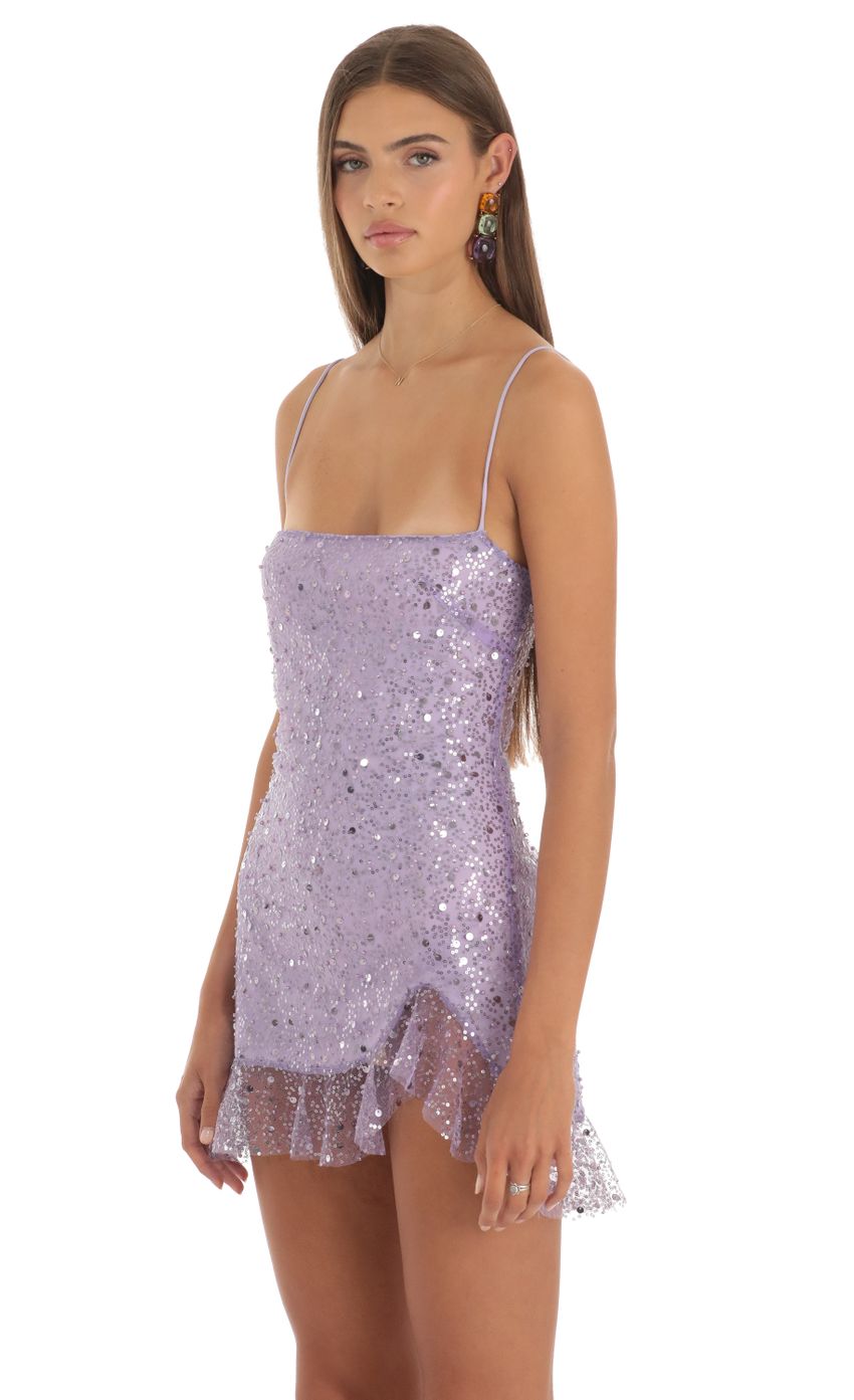 Picture Shimmer Sequin Ruffle Dress in Purple. Source: https://media-img.lucyinthesky.com/data/May23/850xAUTO/7ab51078-0b53-4ec7-b136-a11ea559beb5.jpg