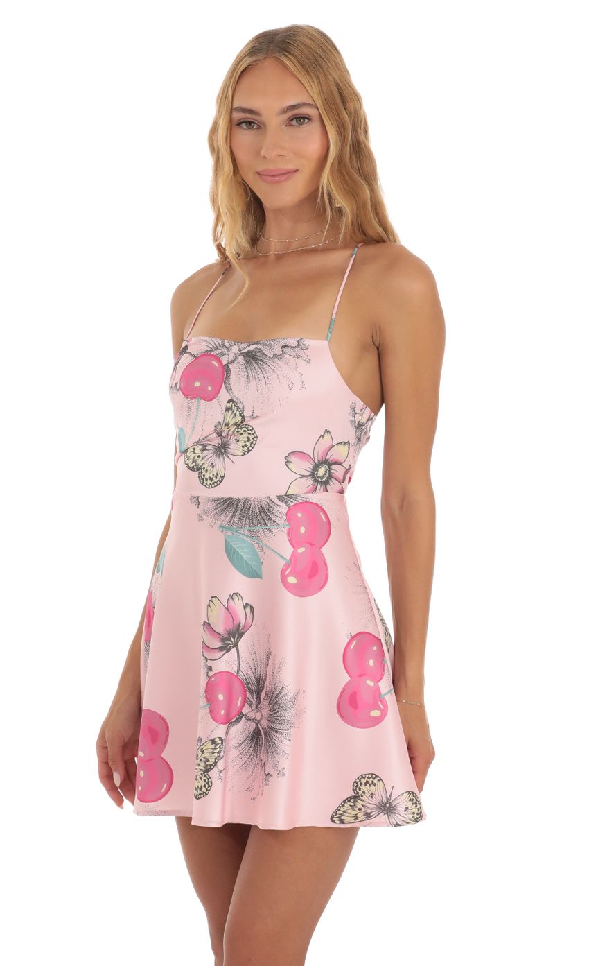 Picture Butterfly Mini Dress in Pink. Source: https://media-img.lucyinthesky.com/data/May23/850xAUTO/7d46efcd-dd73-4756-b117-b4f89f100b9e.jpg