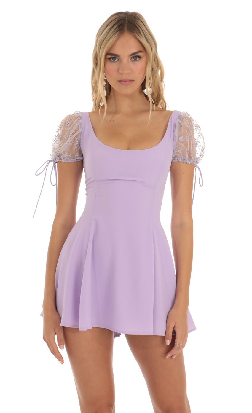 Picture Embroidered Puff Sleeve Dress in Lilac. Source: https://media-img.lucyinthesky.com/data/May23/850xAUTO/84664d39-2385-4cbc-b153-860bf19eef4f.jpg