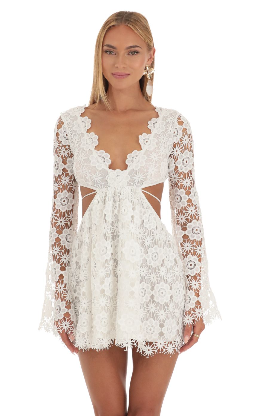 Picture Embroidery Cut-Out Mini Dress in White. Source: https://media-img.lucyinthesky.com/data/May23/850xAUTO/8c4ad852-c9d3-4e35-ab23-bf122b2455dc.jpg