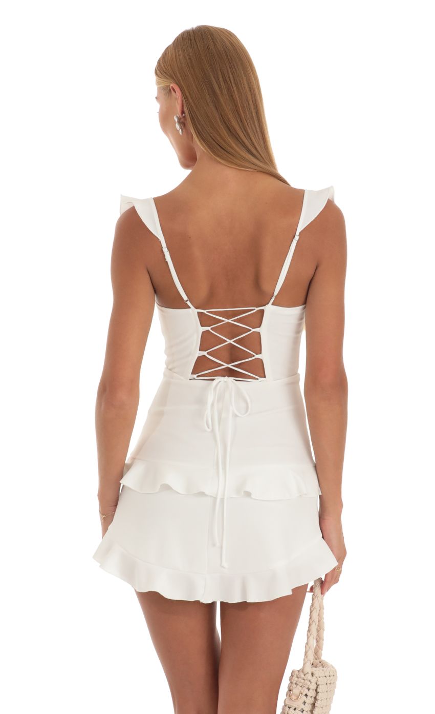 Picture Ruffle Corset Dress in White. Source: https://media-img.lucyinthesky.com/data/May23/850xAUTO/8faa3652-8fd3-4a32-b877-0b73dccff249.jpg