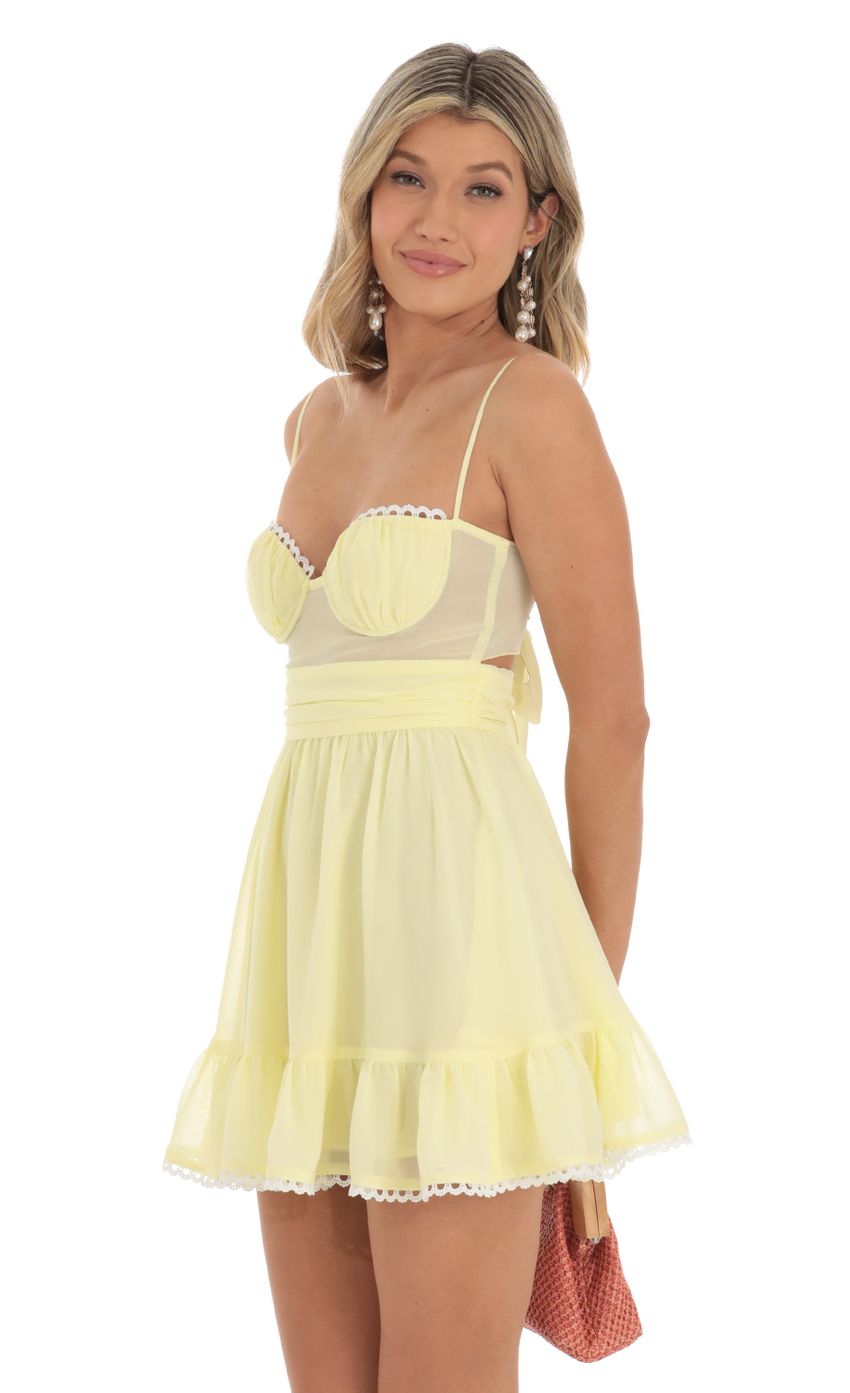 Picture Chiffon Mini Dress in Yellow. Source: https://media-img.lucyinthesky.com/data/May23/850xAUTO/97ce28ca-f133-4669-a39c-869e39725563.jpg