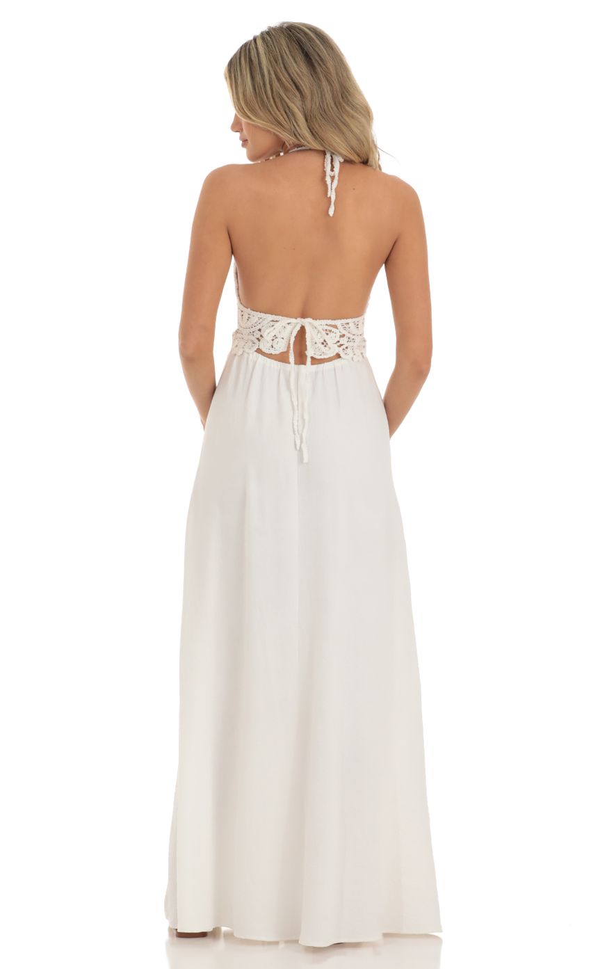 Picture Crochet Cut-Out Maxi Dress in White. Source: https://media-img.lucyinthesky.com/data/May23/850xAUTO/b16e2dcd-c97c-4ef1-abd1-823cf8dc1aad.jpg