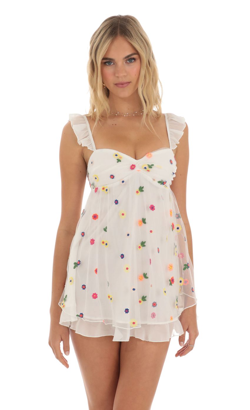 Picture Multi Floral Babydoll Dress in White. Source: https://media-img.lucyinthesky.com/data/May23/850xAUTO/c048d5a4-a825-4f04-a382-5d90f88e91bf.jpg
