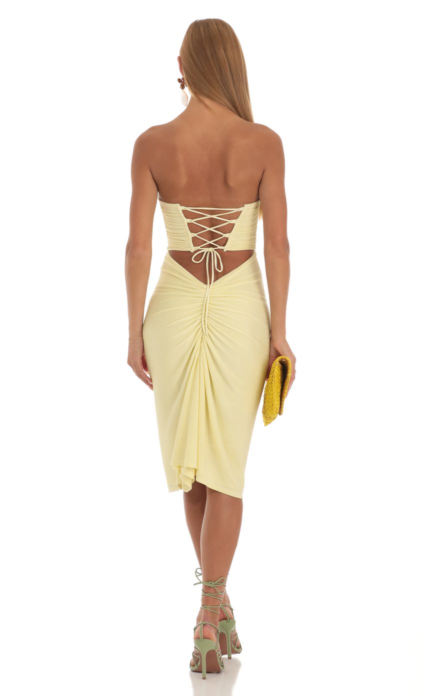 Picture Corset Strapless Dress in Yellow. Source: https://media-img.lucyinthesky.com/data/May23/850xAUTO/c9289ac4-4f84-49b9-b9d4-861620f31b9e.jpg